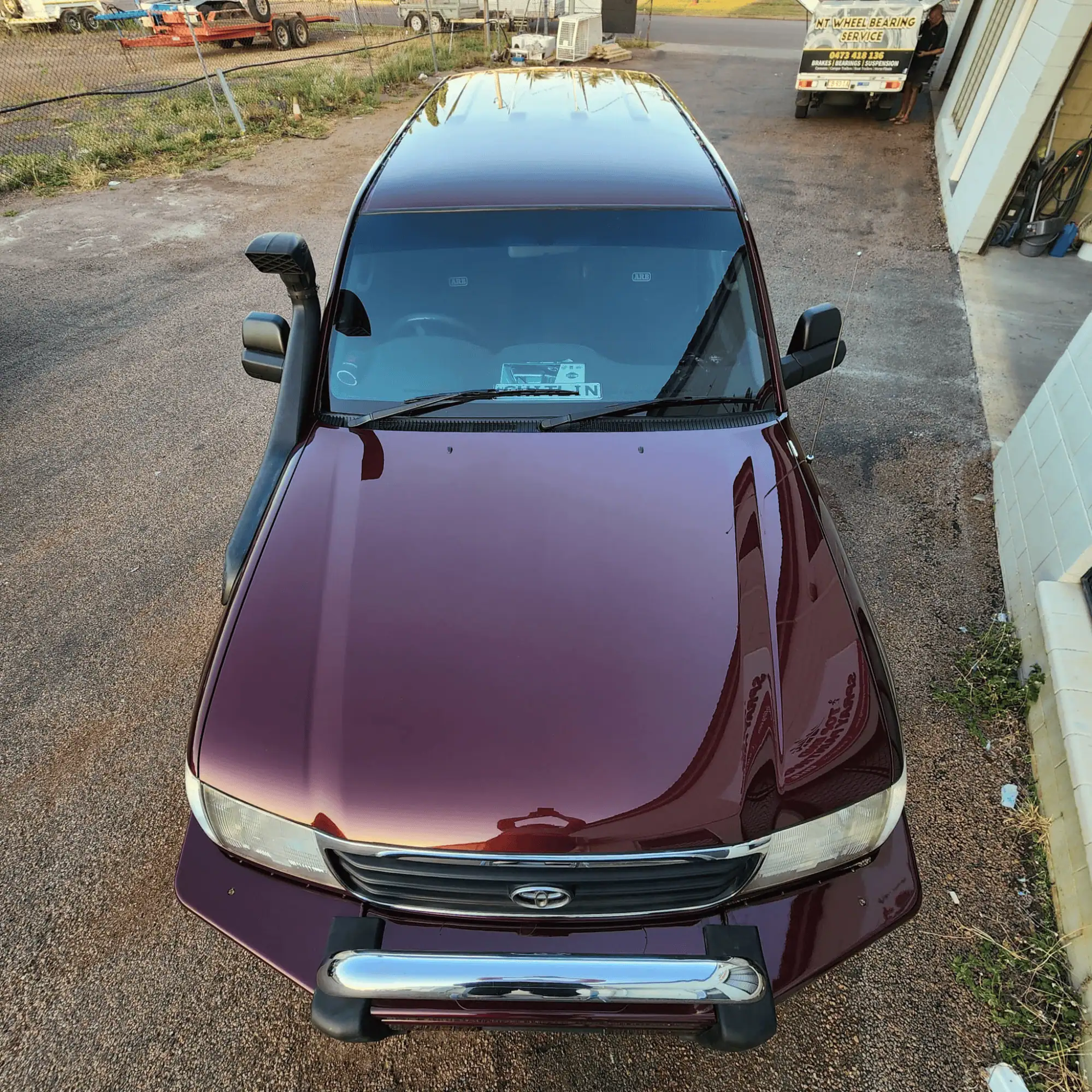 Excellent Spraypainting on Metallic Red 100 Series Landcruiser