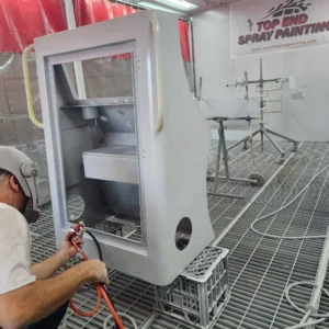 Small component spray painted in the booth at Top End Spray Painting